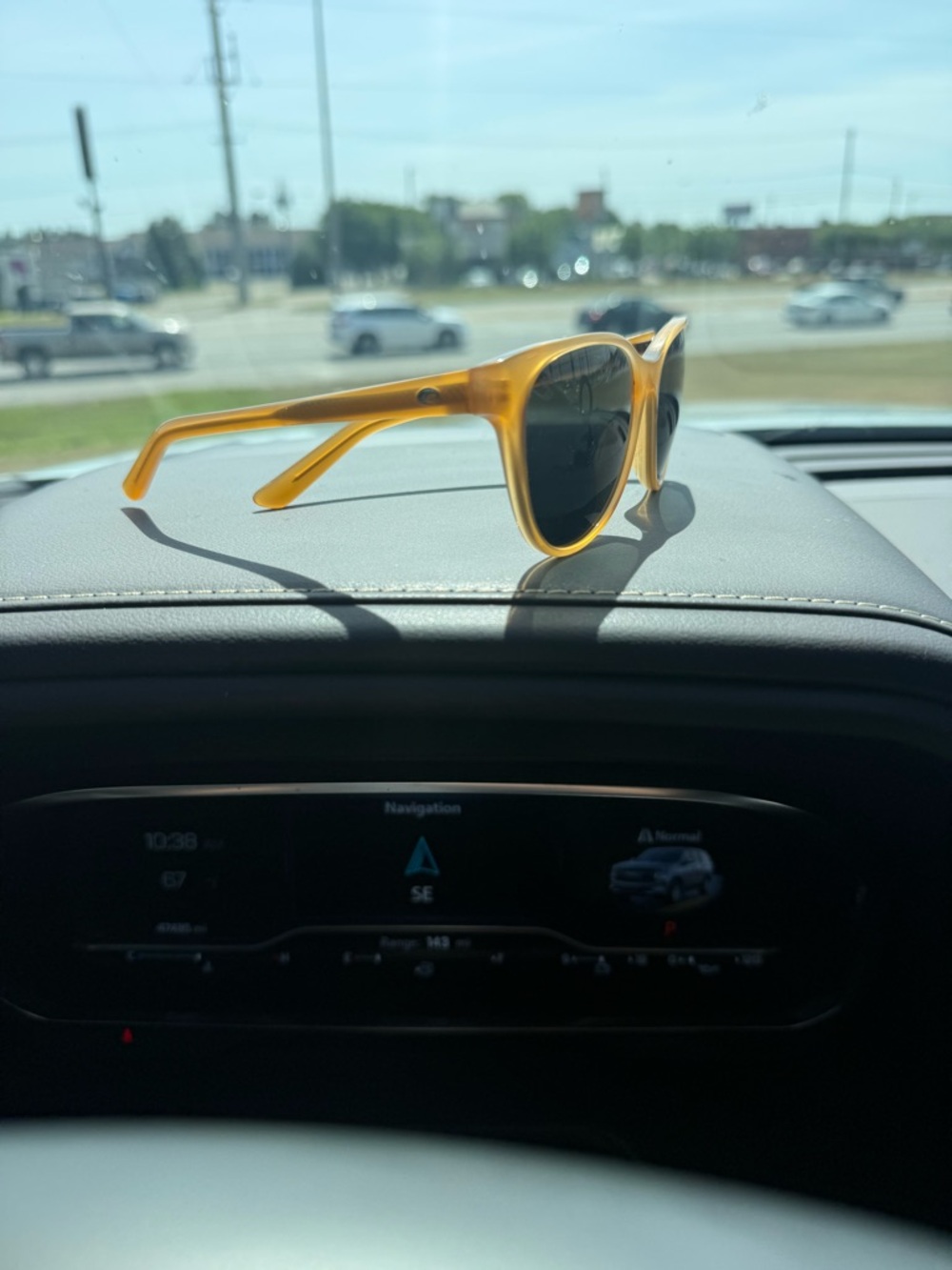 Costa Translucent Yellow Frame Sunglasses with Dark Lenses